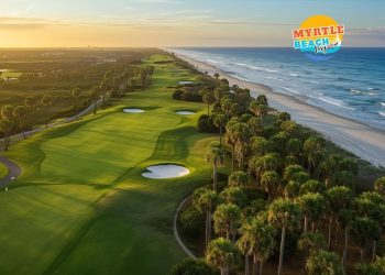 Aerial sunrise view of championship golf course in Myrtle Beach showing pristine fairways, greens, and coastal backdrop - complete guide to Grand Strand golf courses
